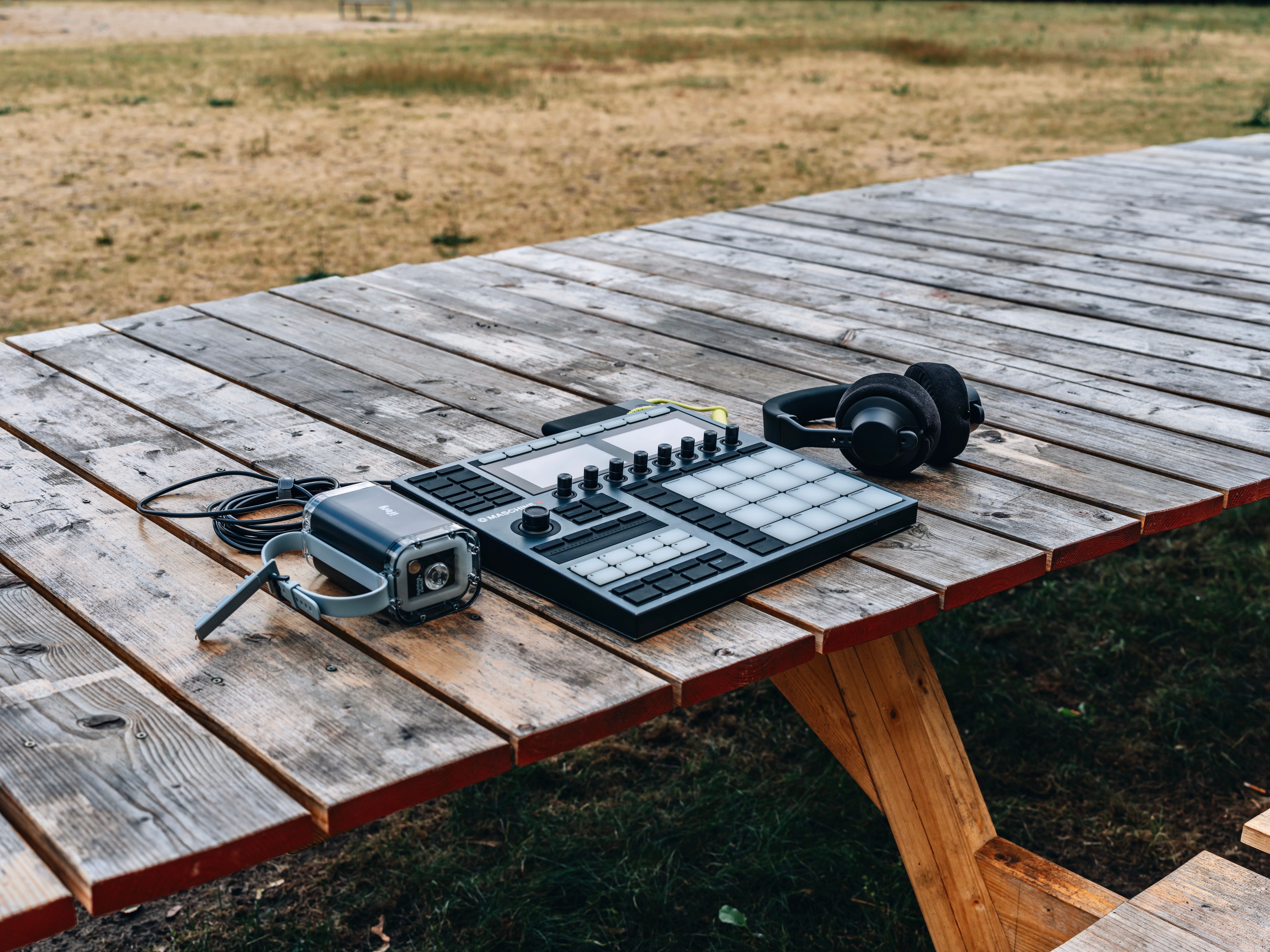 Modern Beatmaker Equipment on Wooden Table in Nature · Free Stock Photo