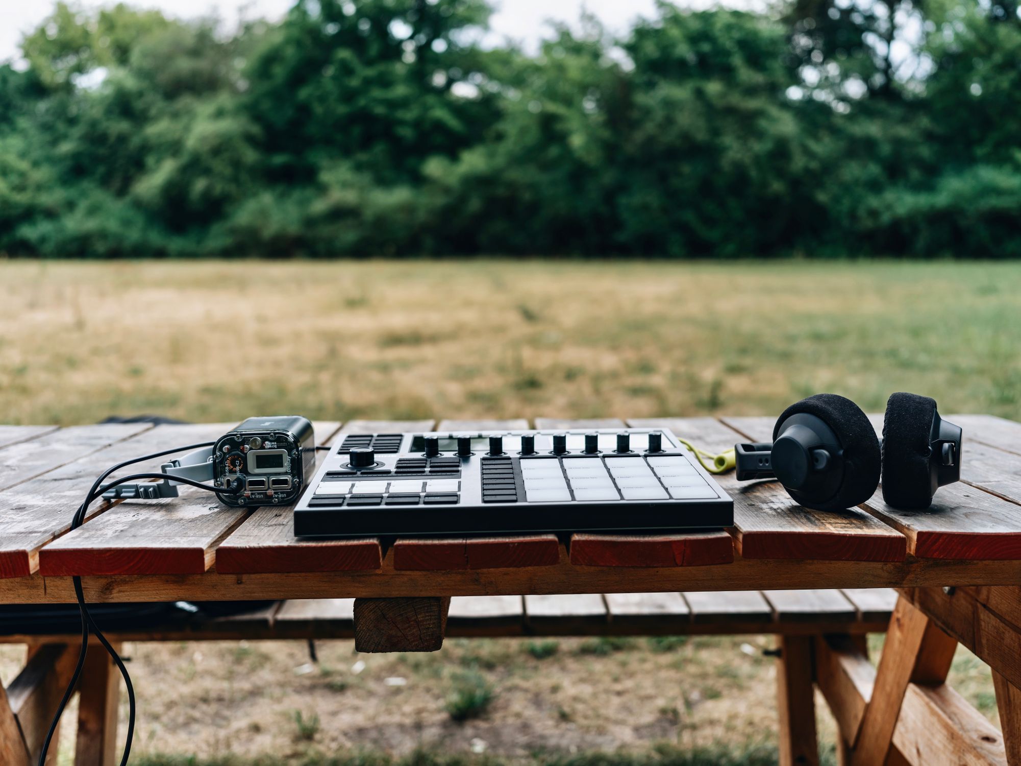 Modern Things Instruments Modern Music Equipment on Wooden Table in Nature · Free Stock Photo
