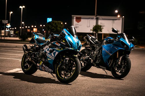 Two Modern Motorcycles at Night