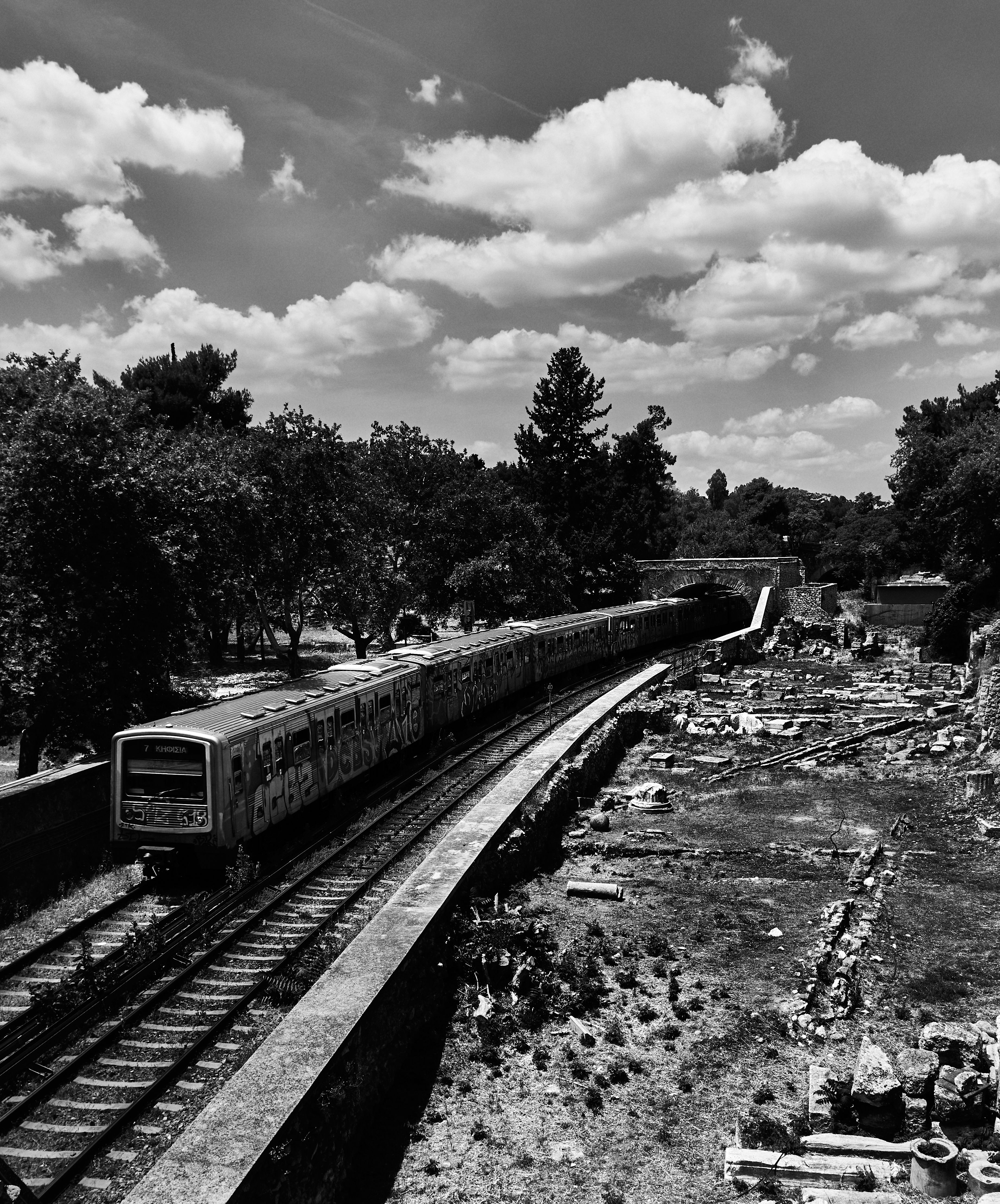 Black and White Photo of a Train and Railway Tracks · Free Stock Photo