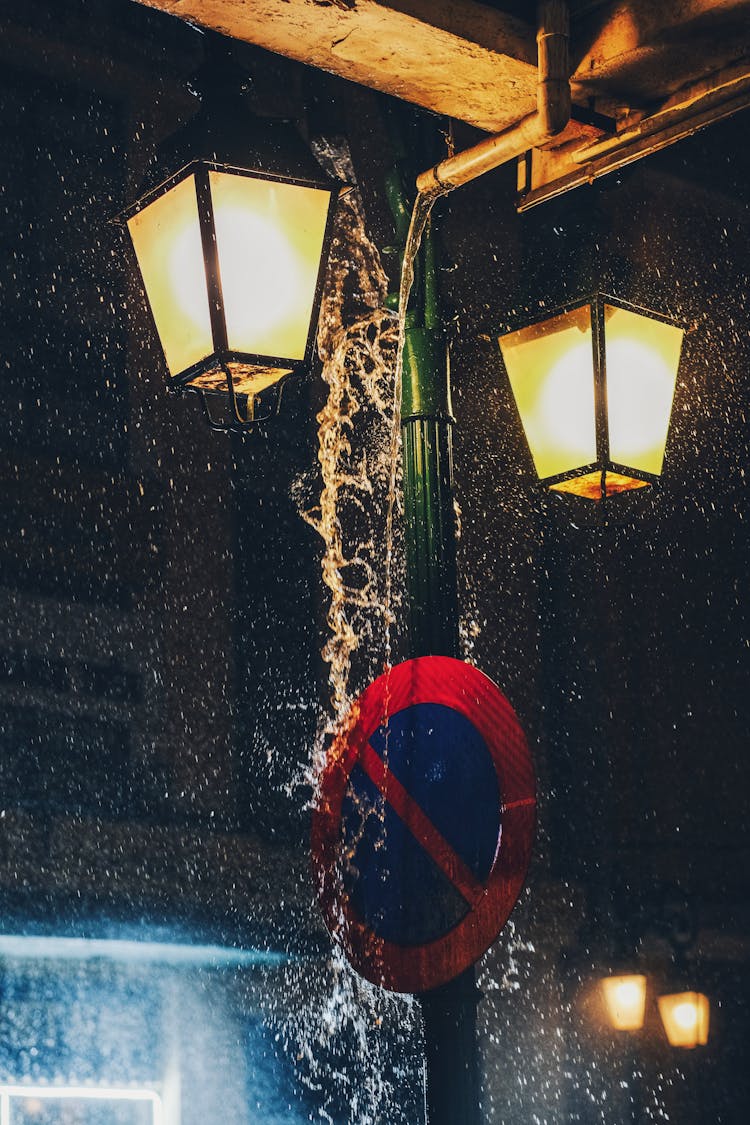 Downpour Over Street Lamps At Night