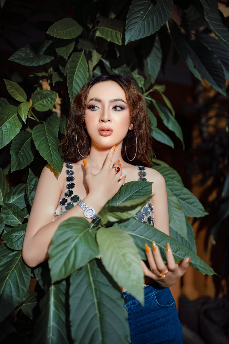 Woman Posing Among Leaves