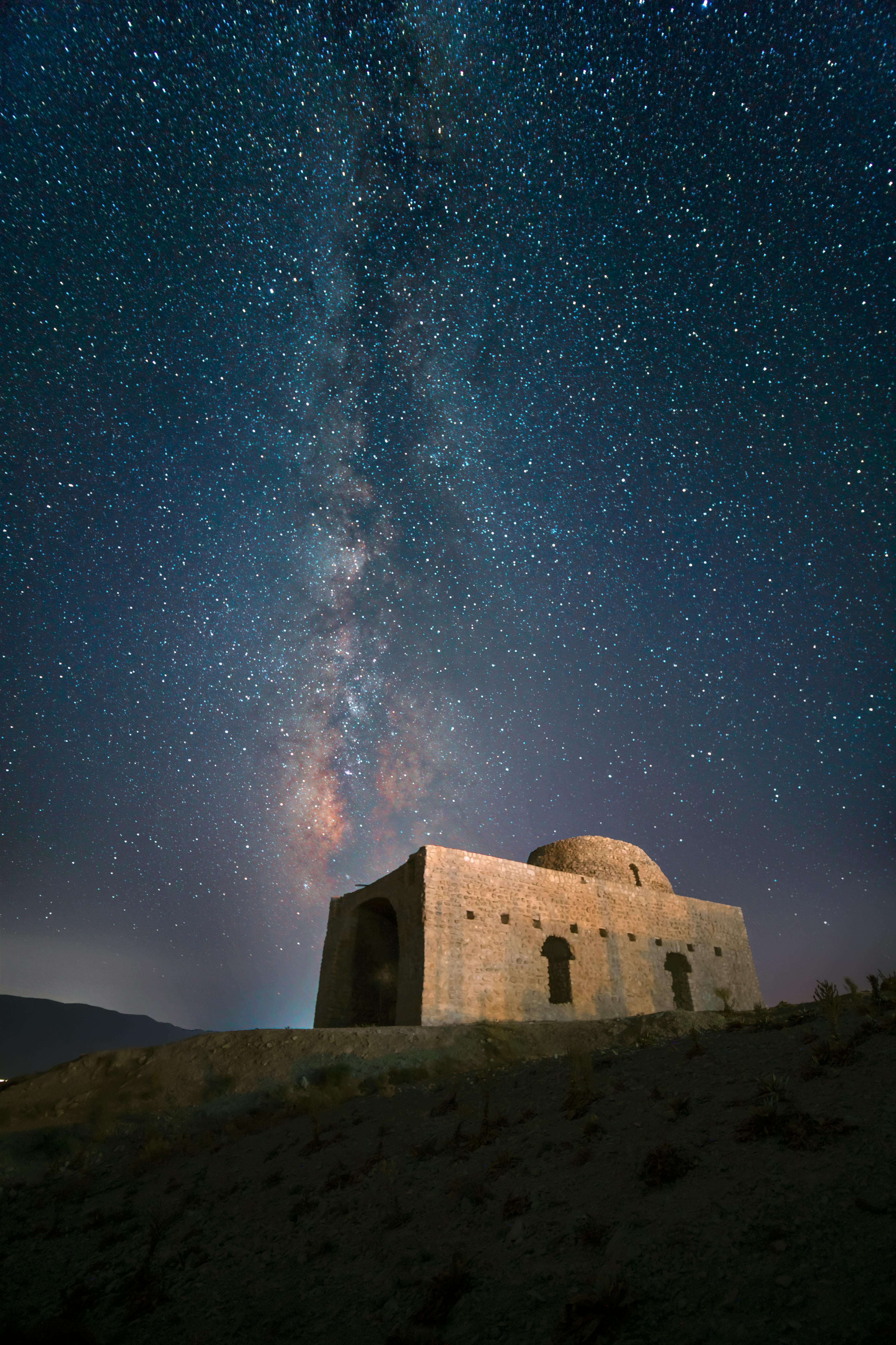 stars on night sky over aspakhu fire temple in iran