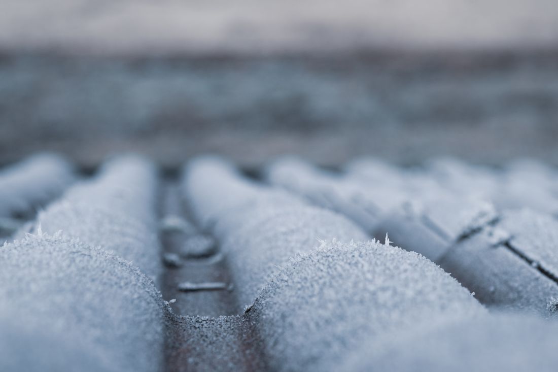 Close-up of frosty roof shingles