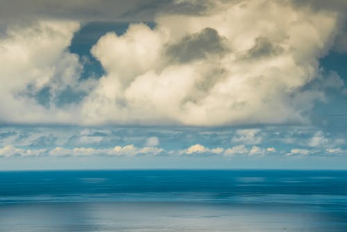 Blue Sea under White Clouds