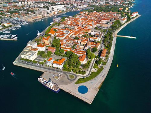 Free Stunning aerial view of Zadar's historic peninsula in Croatia, showcasing its unique architecture and coastal beauty. Stock Photo