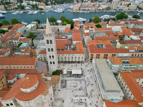 Free Discover Zadar, Croatia from above with this stunning aerial cityscape featuring historic architecture and vibrant rooftops. Stock Photo