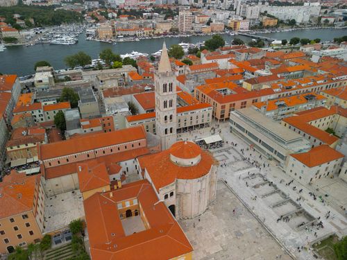 Free Aerial view of Zadar, Croatia showcasing St. Donatus Church and Adriatic Sea. Stock Photo