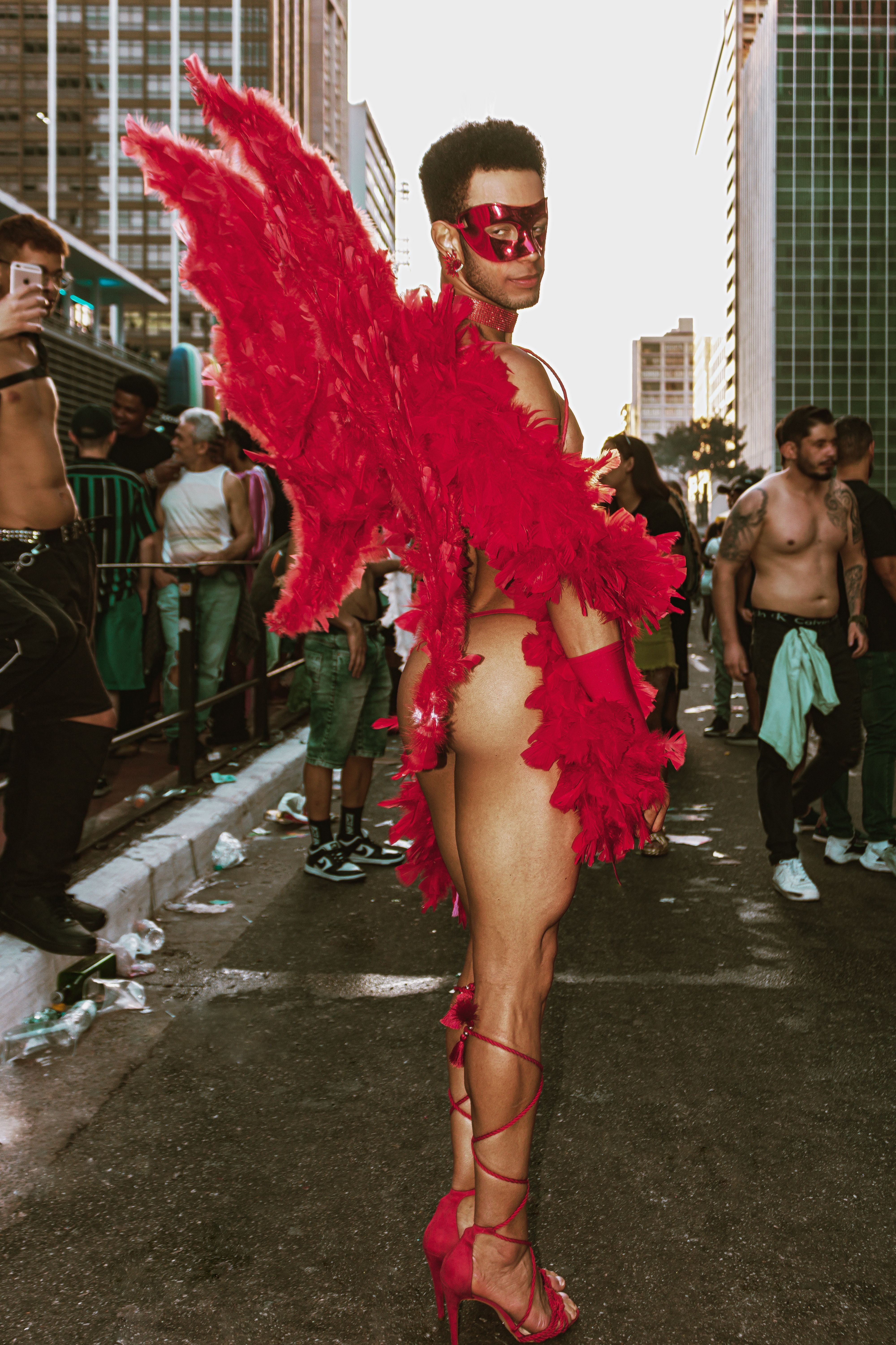 Colorful costumes and lively celebrations at São Paulo Pride Parade.
