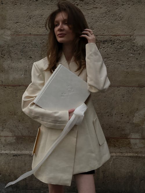 Portrait of Woman in White Coat