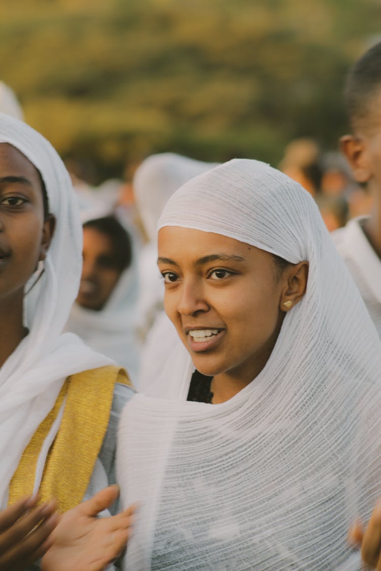 Woman In A Headscarf Talking