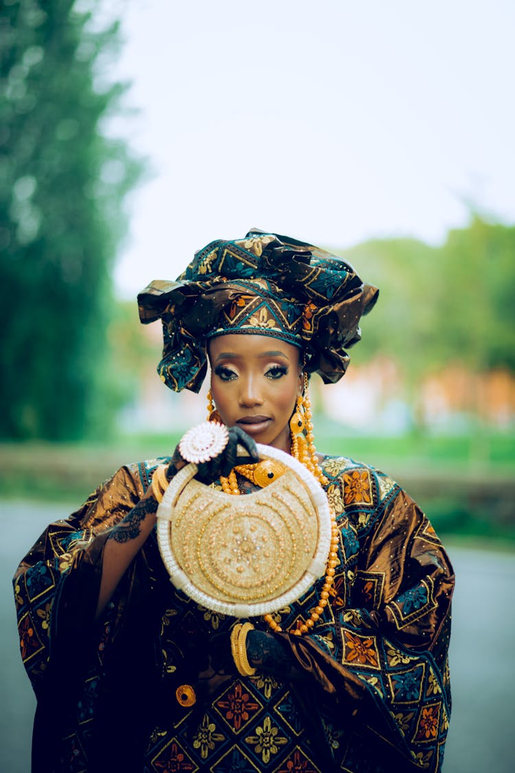 Young Woman Wearing A Traditional Gown And A Turban 