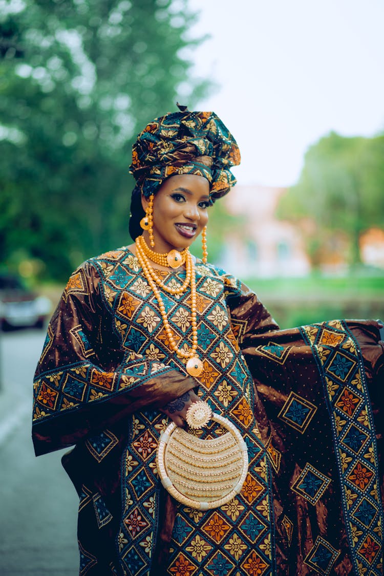 Young Woman Wearing A Traditional Gown And A Turban 