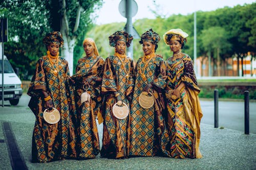 Women Posing in Traditional Clothing