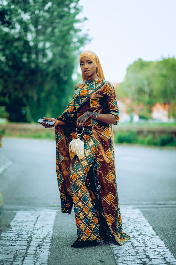 Young Woman Wearing A Traditional Gown And Headscarf