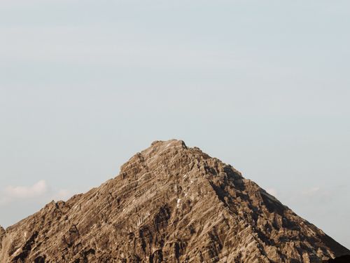 Free Breathtaking view of a rugged mountain peak in Malbun, Liechtenstein, under a clear sky. Stock Photo