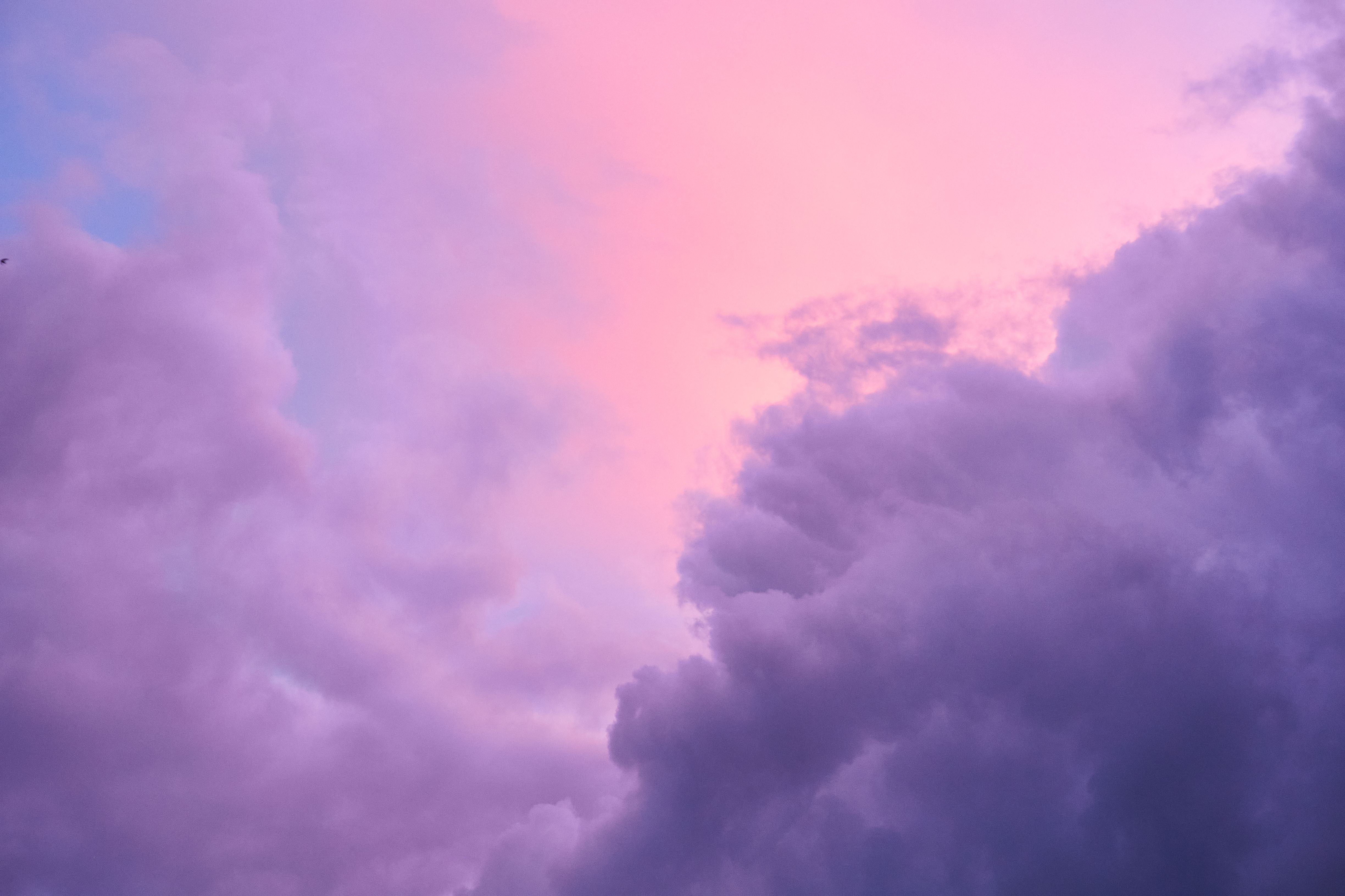 Aerial view of dramatic purple clouds at twilight in Penrith, England, creating a mesmerizing sky.