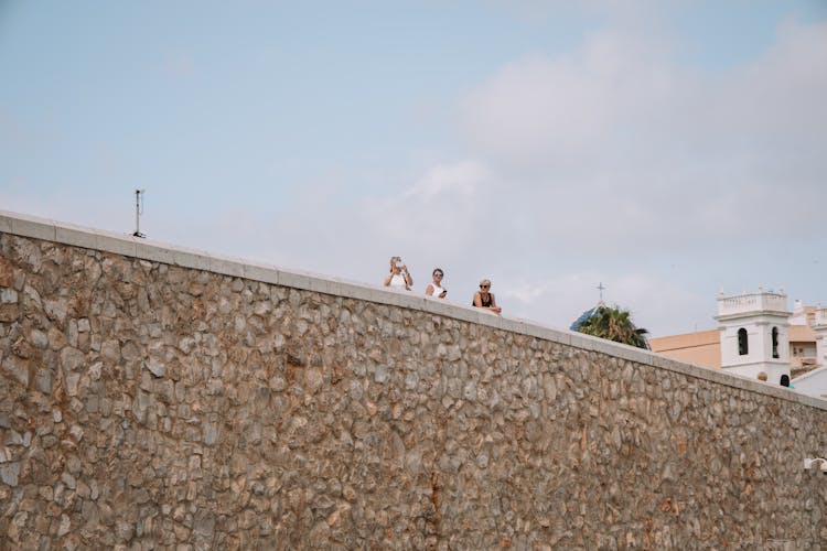 Tourists On The Stone Bridge