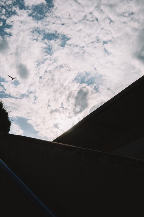 Free A dramatic cloudscape over a building silhouette in Valencia, Spain. Stock Photo