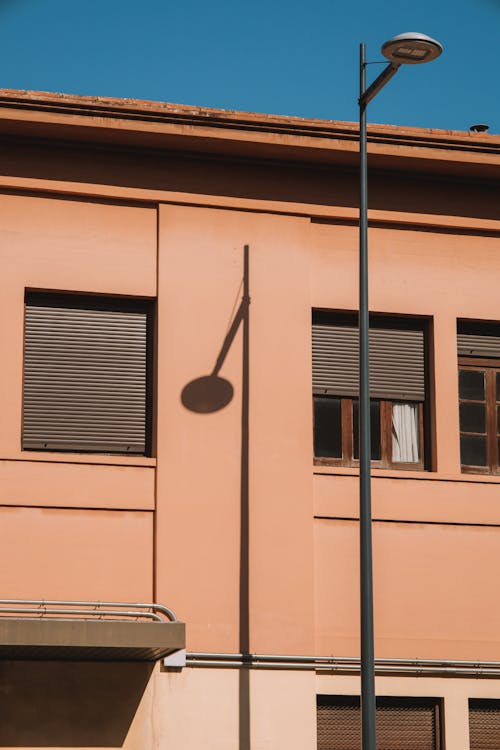 Free Shadow of Urban Lantern on Wall Stock Photo