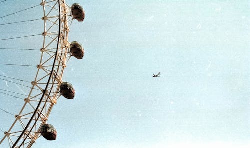 An Airplane and a Ferris Wheel