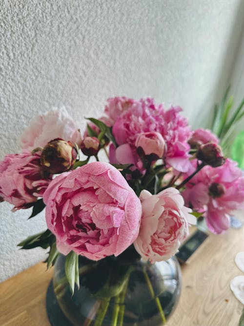 A Bunch of Peonies in a Glass Vase