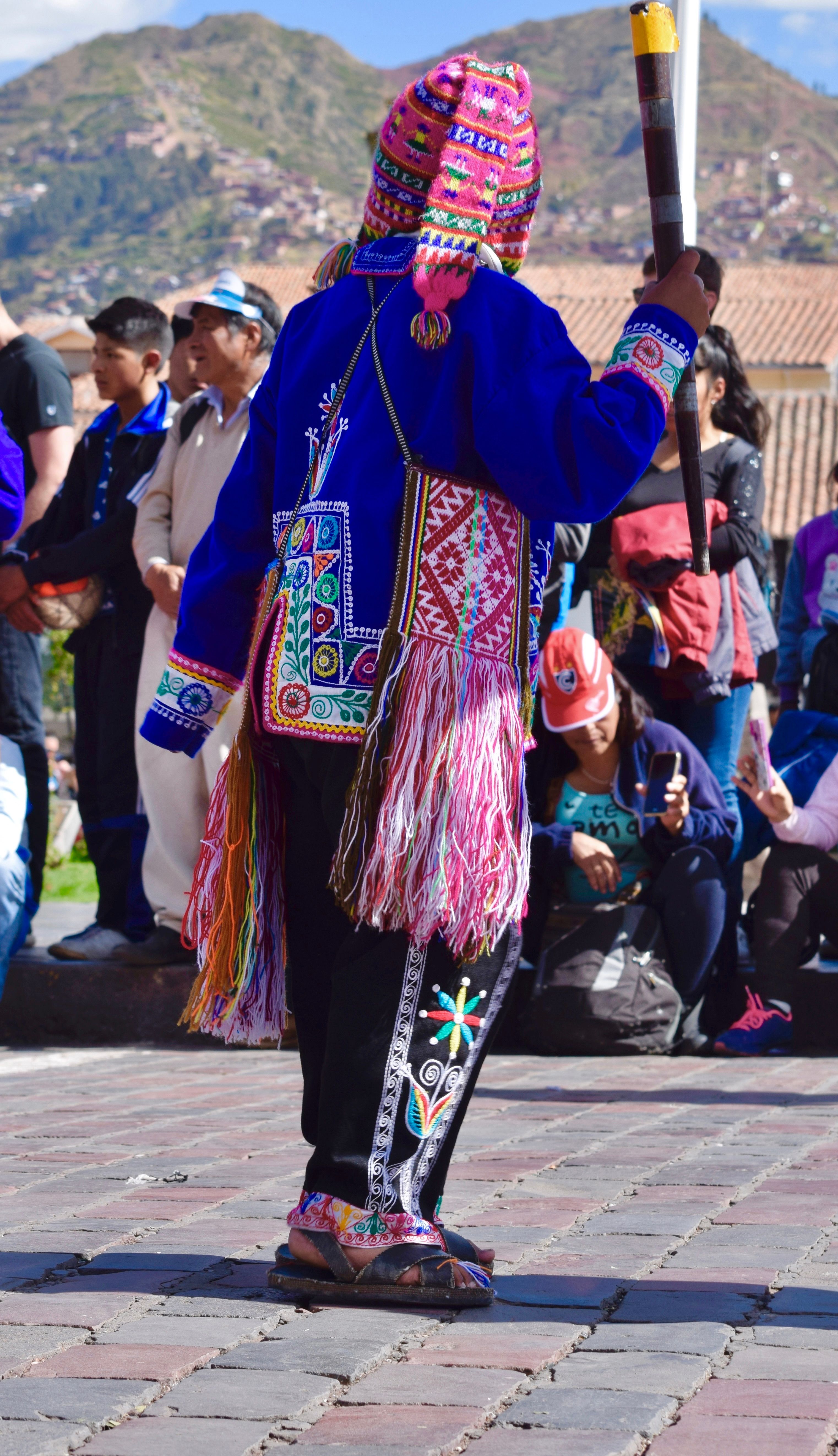 Man in Colorful, Traditional Clothing at Festival · Free Stock Photo