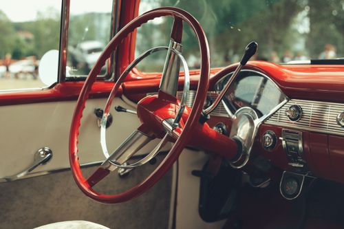 Free Explore the vintage interior of a classic Chevrolet, showcasing its iconic design and style. Stock Photo