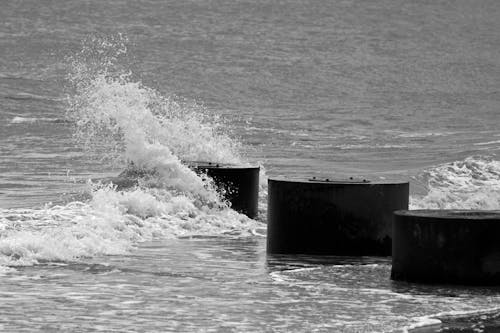 North Sea waves crashing into a breakwater tidal defence