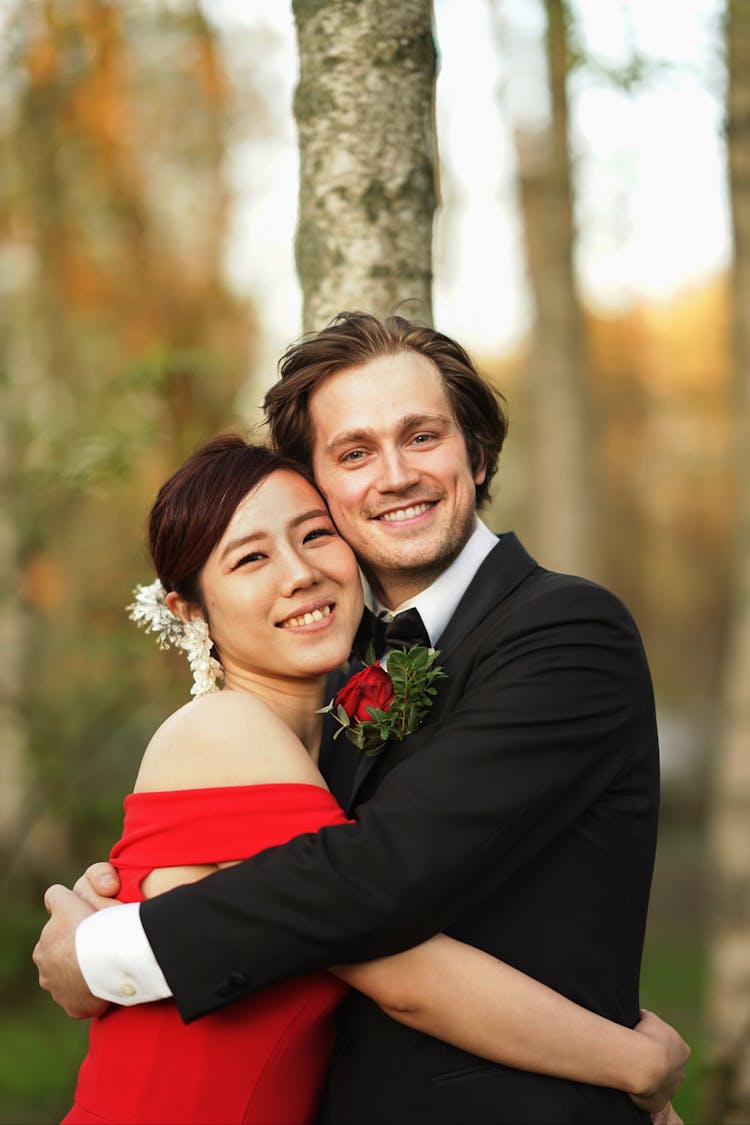 A Portrait Of A Couple In Forest