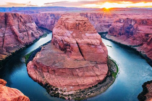 Captivating aerial view of Horseshoe Bend at sunset in Page, Arizona, highlighting the Colorado River's unique curve.
