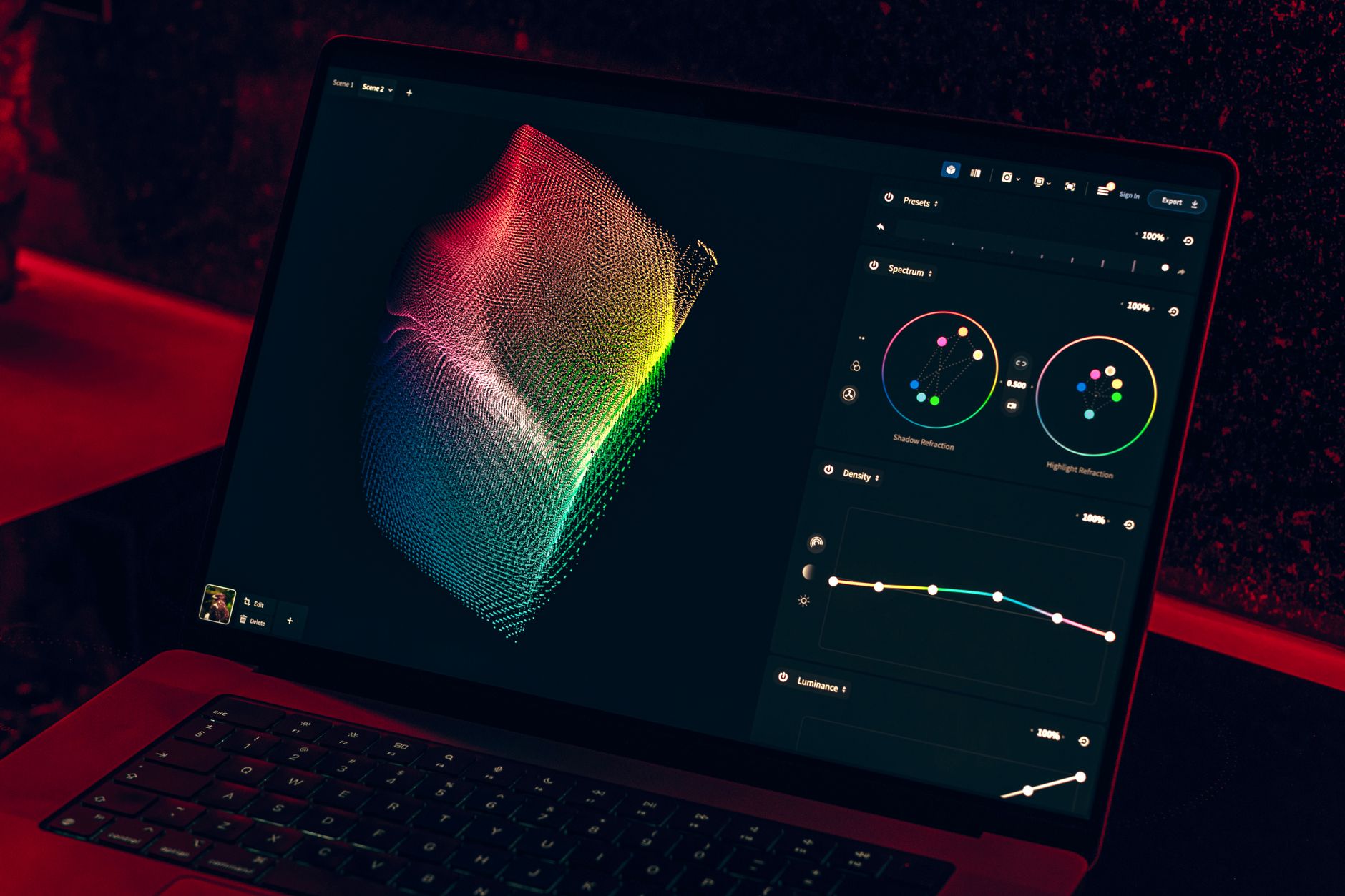 Close-up of a colorful data visualization displayed on a laptop screen in a dimly lit room.