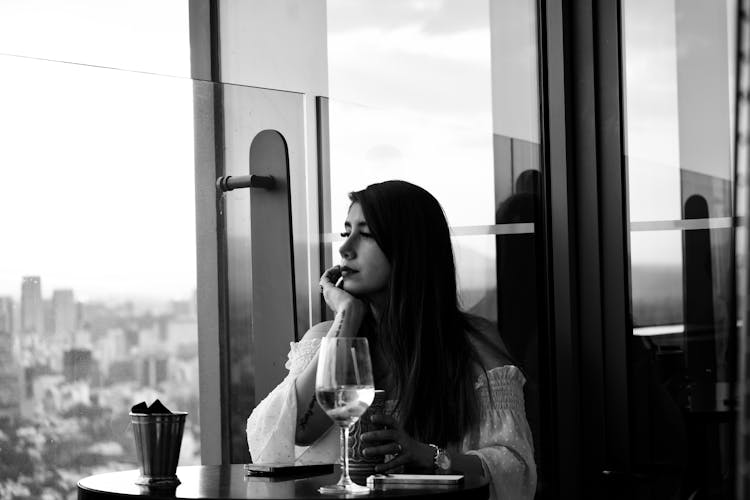 Pensive Woman At Restaurant