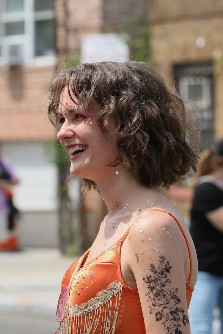 Smiling Woman With Tattoo