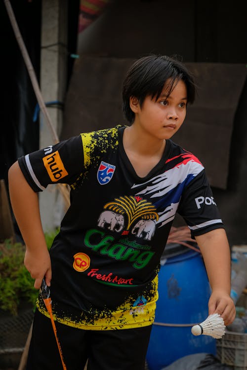 Boy Playing Badminton