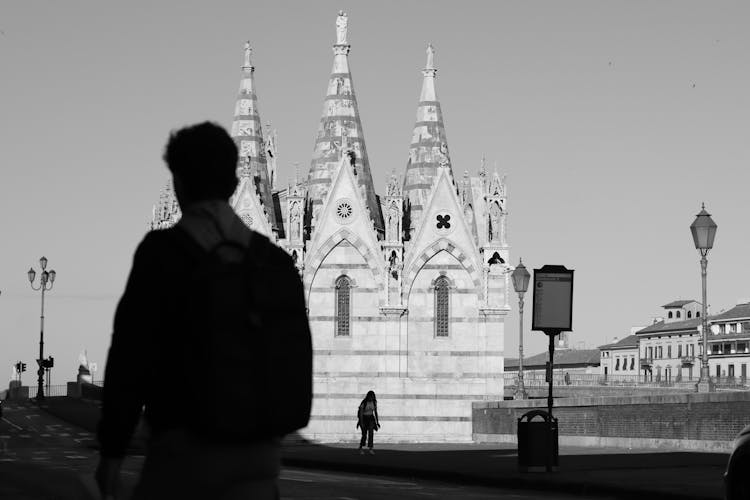 Santa Maria Della Spina Church In Pisa Behind Man Silhouette