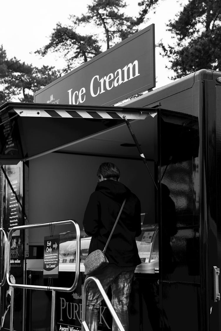 Woman Near Ice Cream Stand