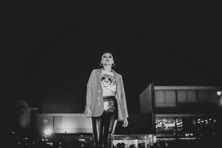 Woman Walking And Posing At Night