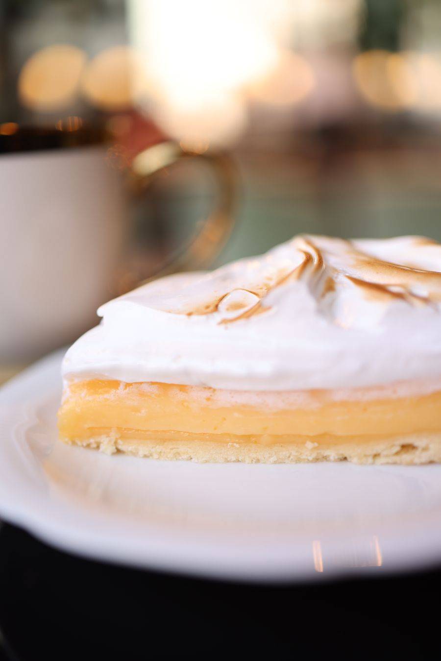 Slice of Lemon Rub Pie with a flaky golden crust
