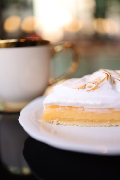 Free Cake with Cream on Plate Stock Photo