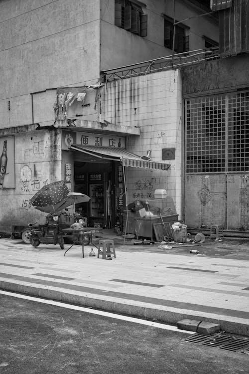 Sidewalk near Building in Black and White