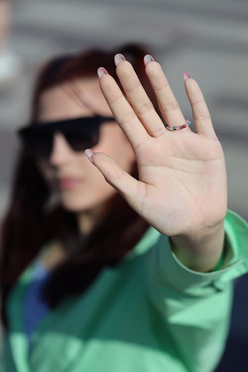 Sunlit Hand of Woman