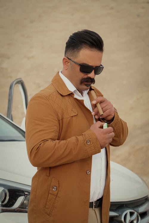 Man Lighting up a Cigar 