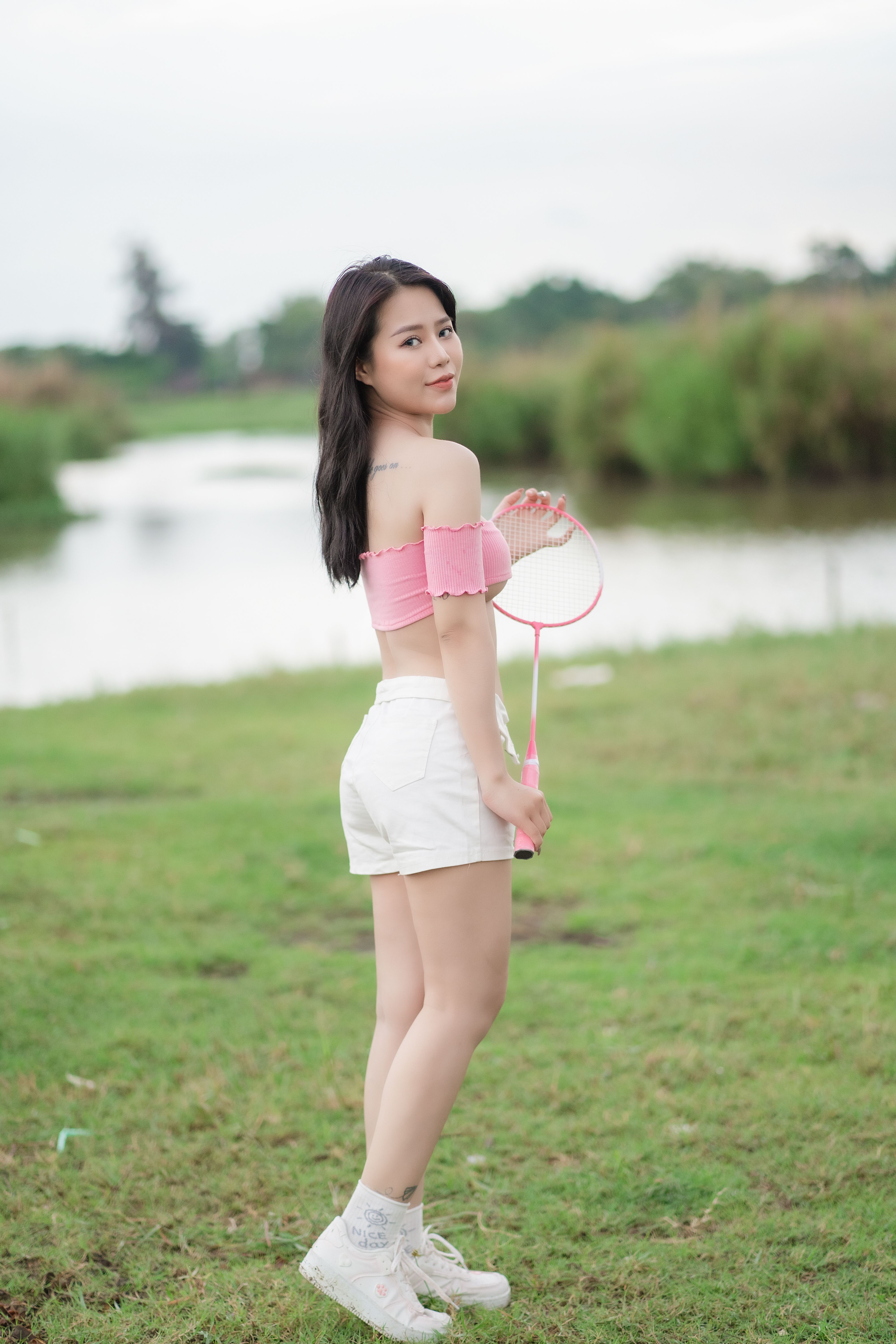 Woman Posing with Badminton Racket · Free Stock Photo