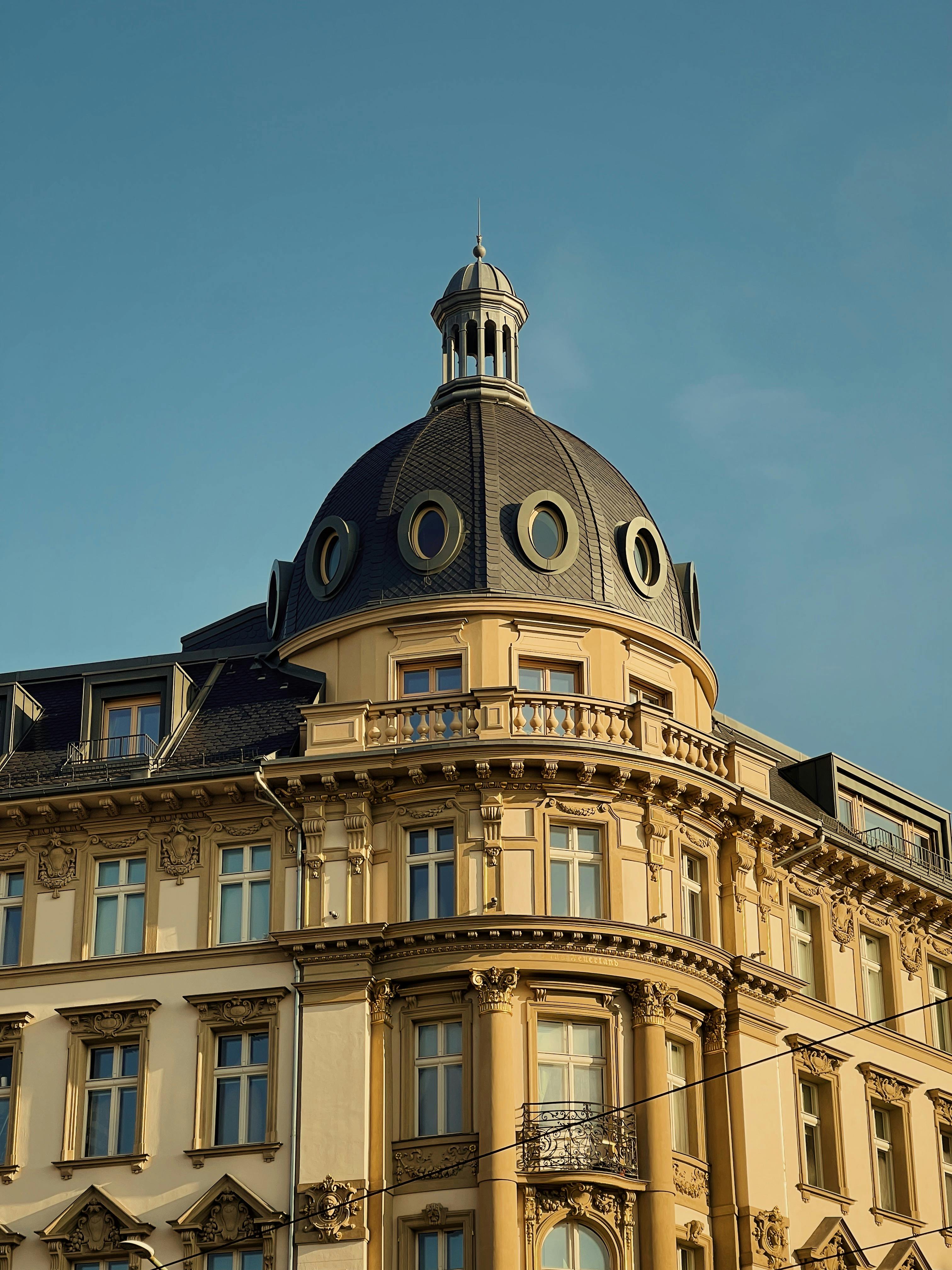 Neoclassical architecture in Berlin under a clear blue sky.
