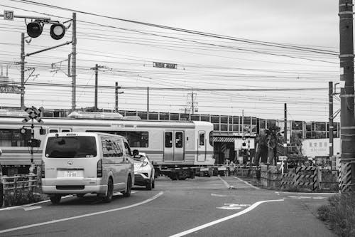 Train and Cars at Level Crossing