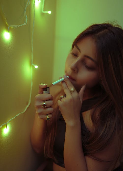 Woman Lighting Cigarette