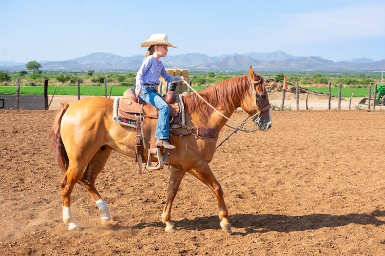 Girl Riding Horse