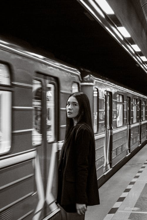 A Young Woman in the Underground in Black and White