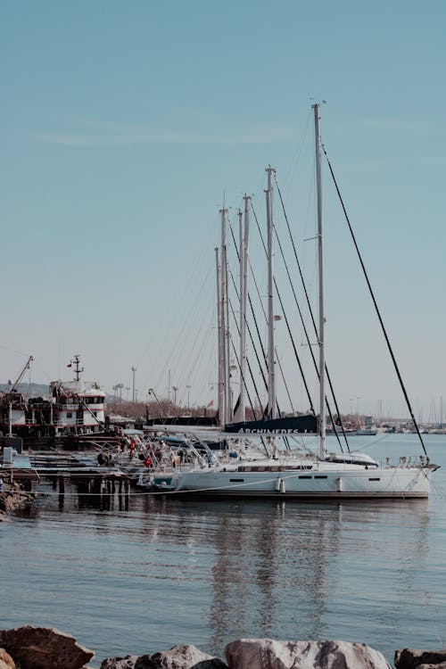 Sailing Yachts Moored to the Pier